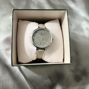 Tan Kate Spade watch with thin straps